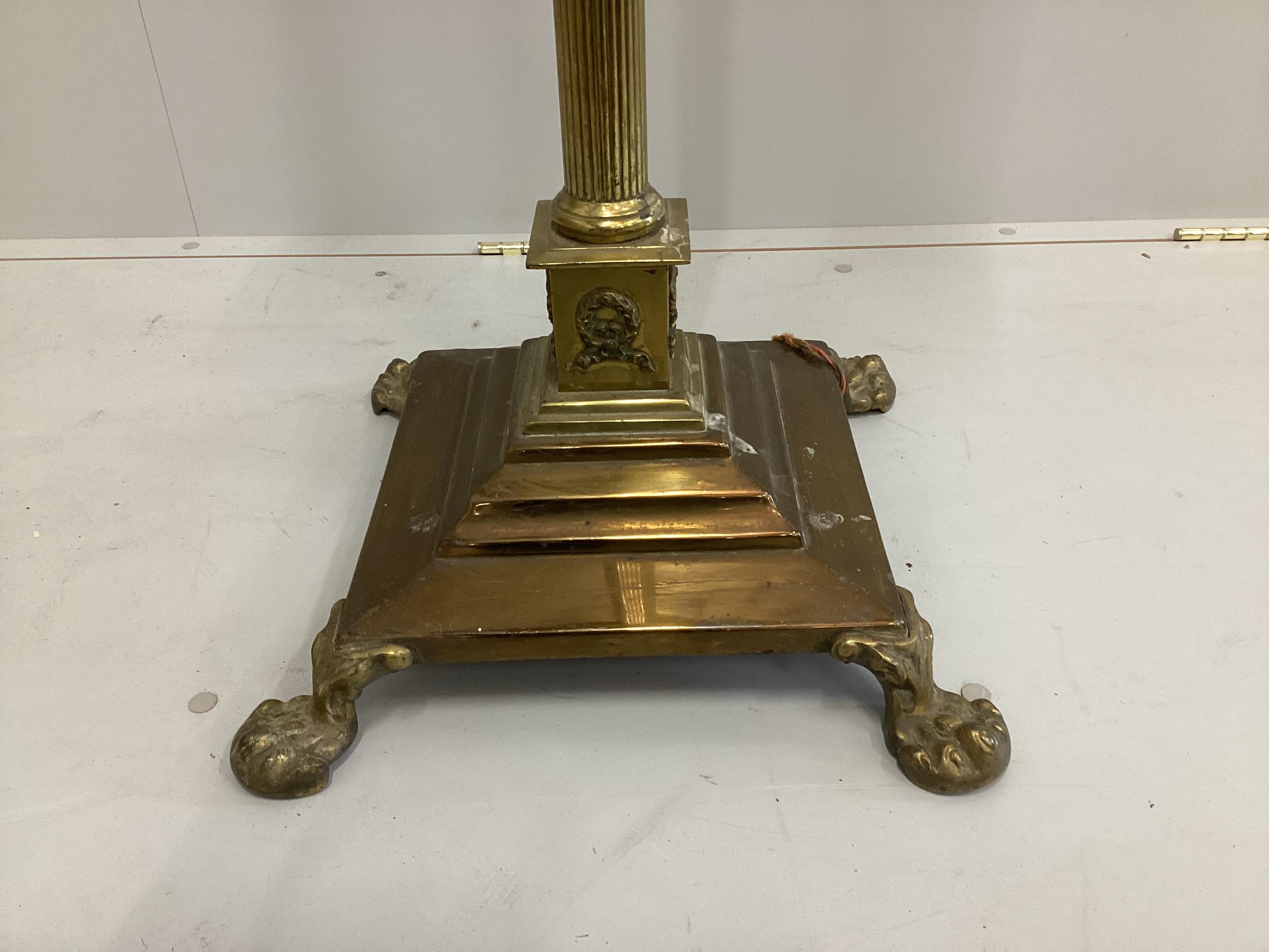 An Edwardian brass Corinthian column telescopic standard lamp, converted